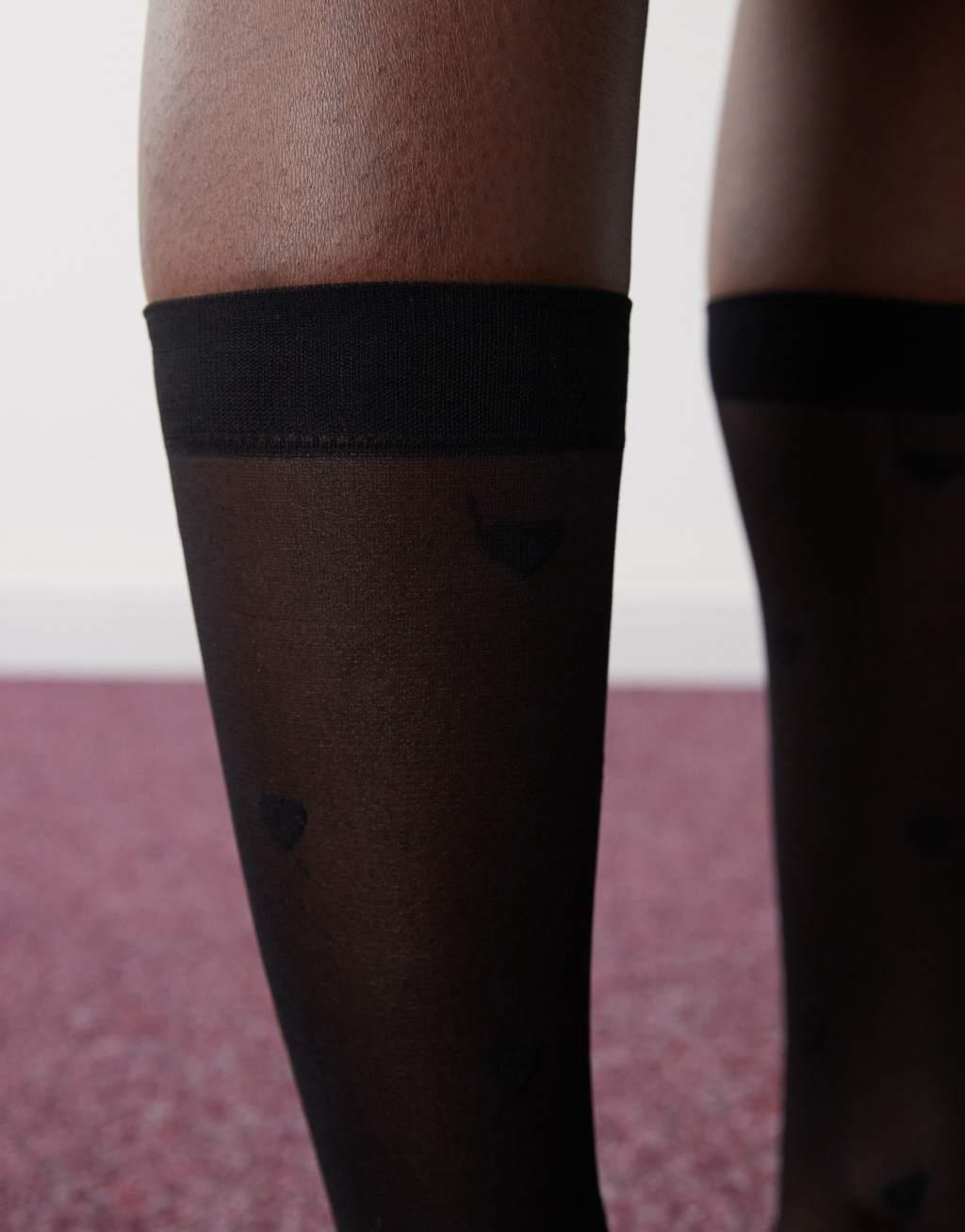 Reclaimed Vintage knee high socks with hearts in black Product Image