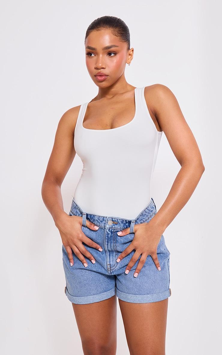 PRETTYLITTLETHING Mid Blue Wash Turn Up Mom Denim Shorts Product Image