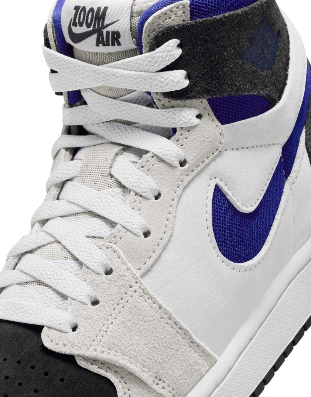 Nike Air Jordan 1 Zoom Comfort 2 sneakers in white, black, and blue Product Image