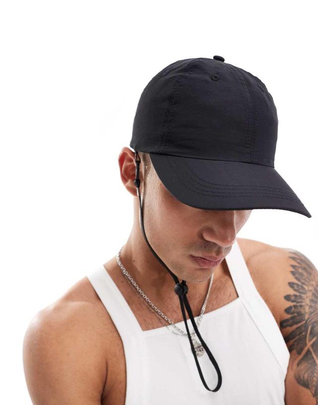 ASOS DESIGN nylon cap with drawstring in black Product Image