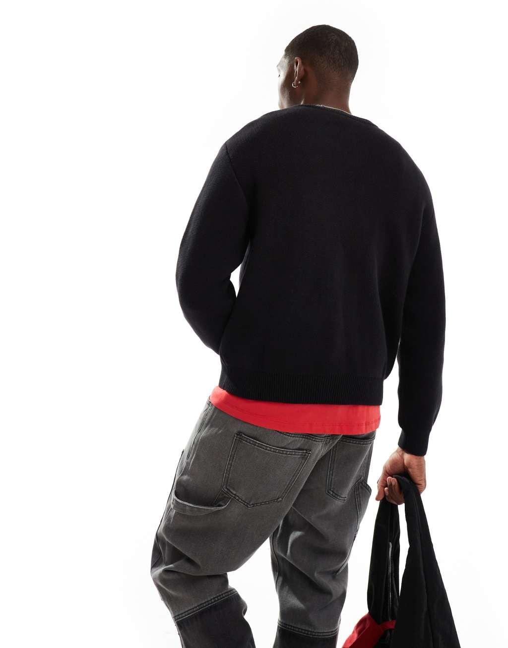 Weekday Emilio sweater with varsity style jacquard graphic in red Product Image