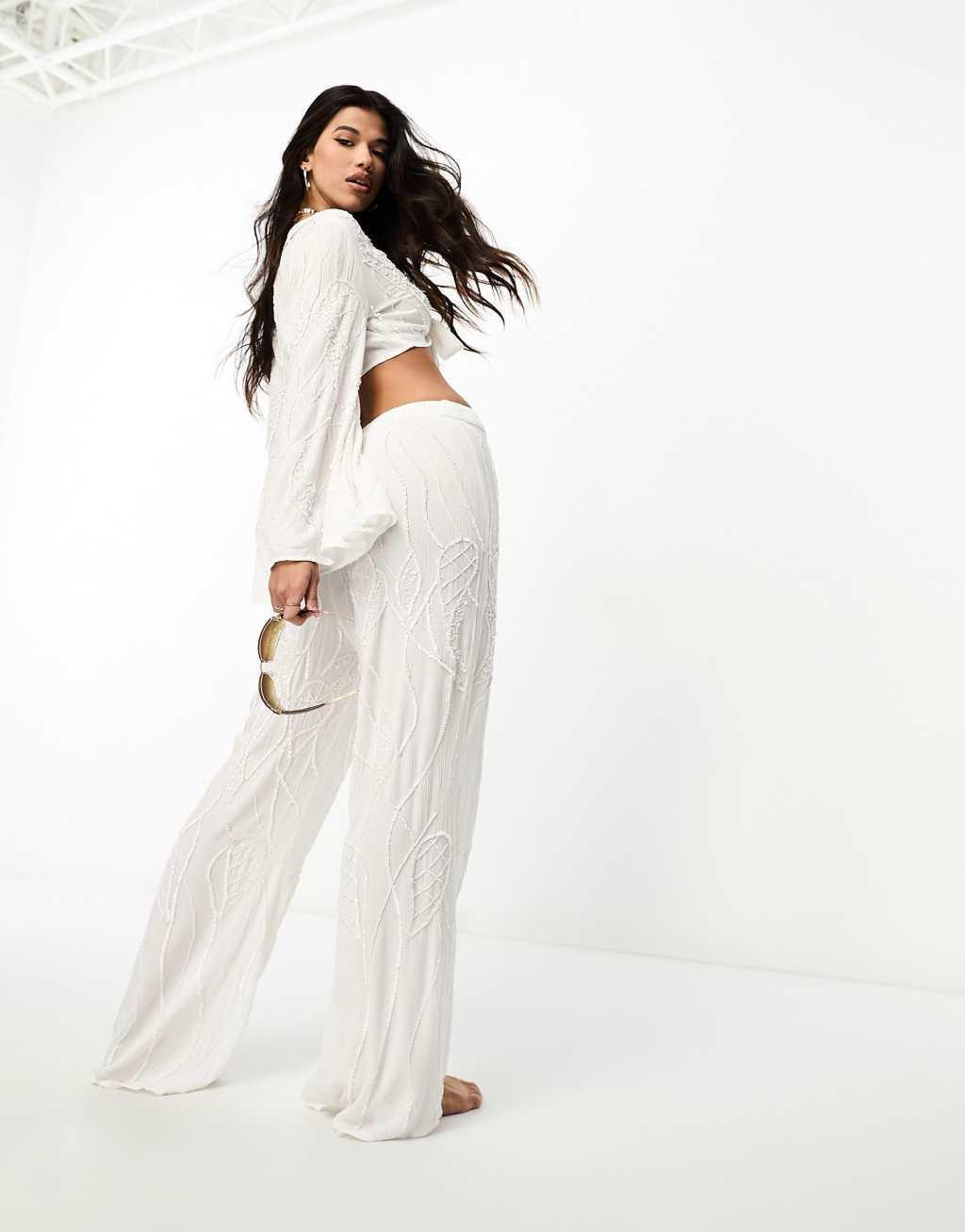 ASOS DESIGN premium embellished wide leg beach pants in white Product Image