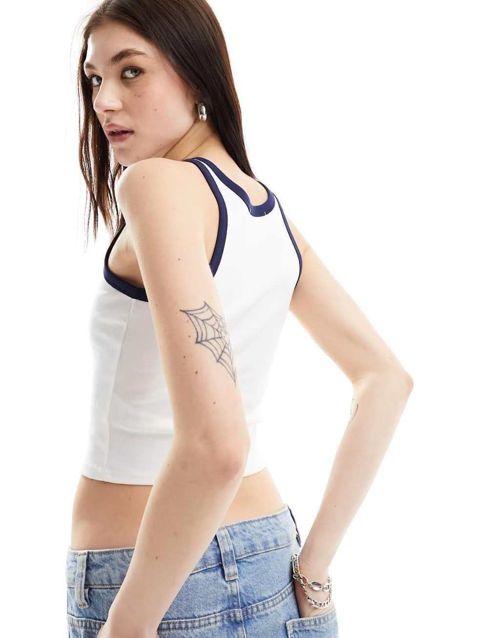 Urban Revivo contrast ringer racer back tank top with mini slogan in white and navy Product Image