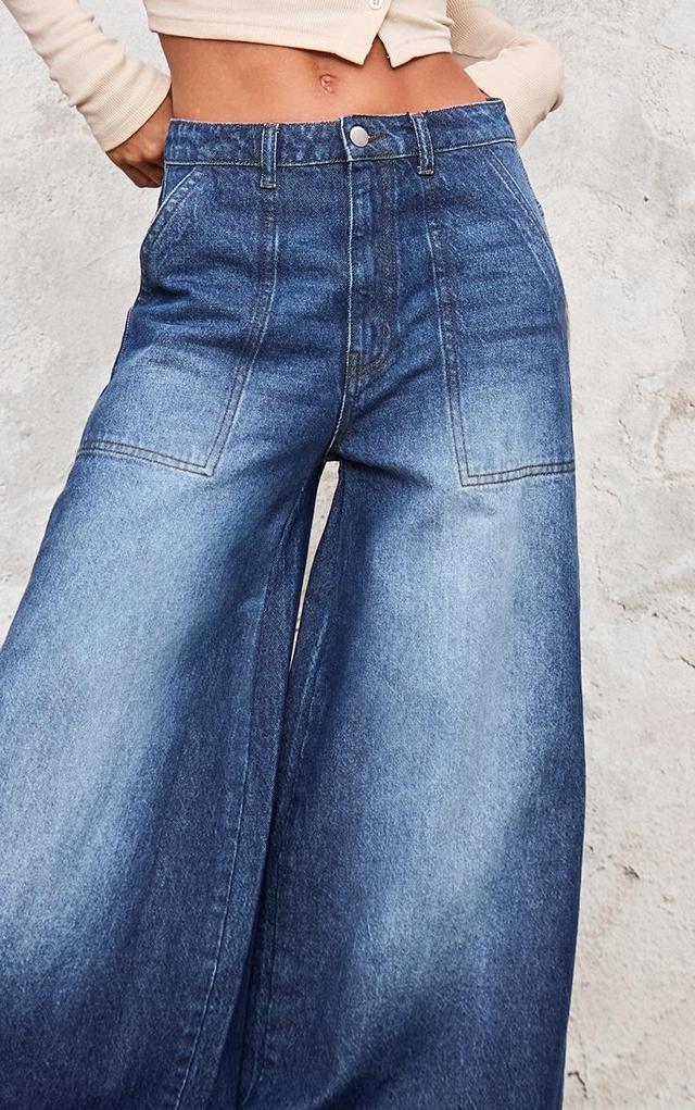 Mid Blue Wash Mid Rise Wide Leg Jeans Product Image