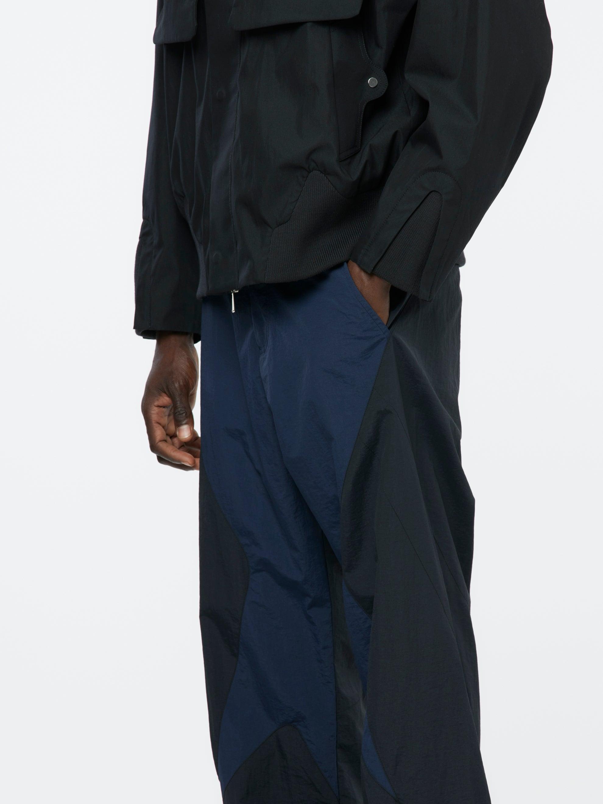 TRACK PANT (Black / Dark Blue) Product Image