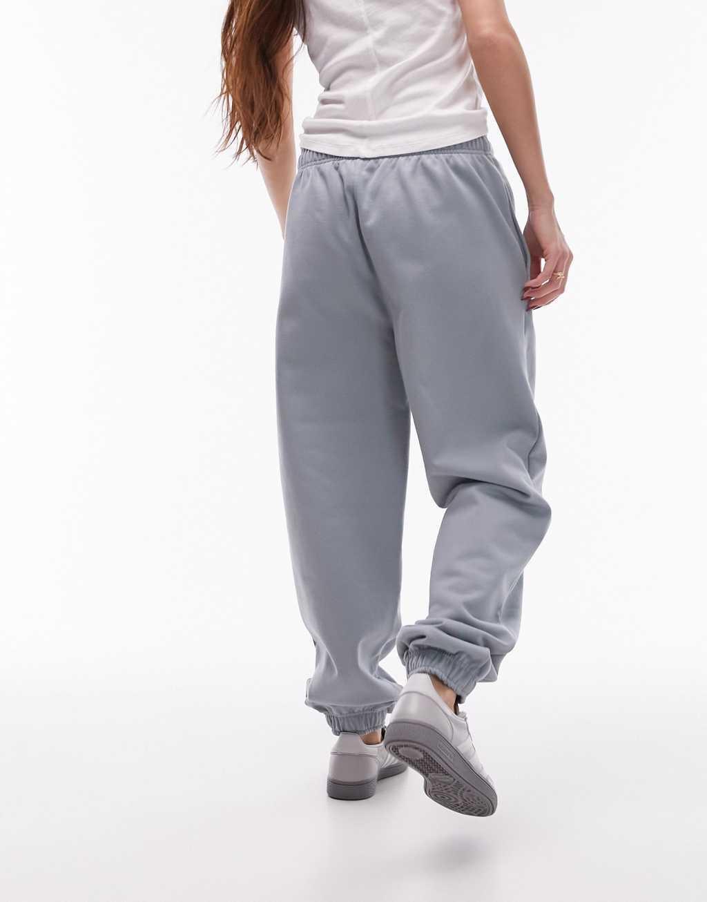 Topshop oversized cuffed sweatpants in soft blue Product Image