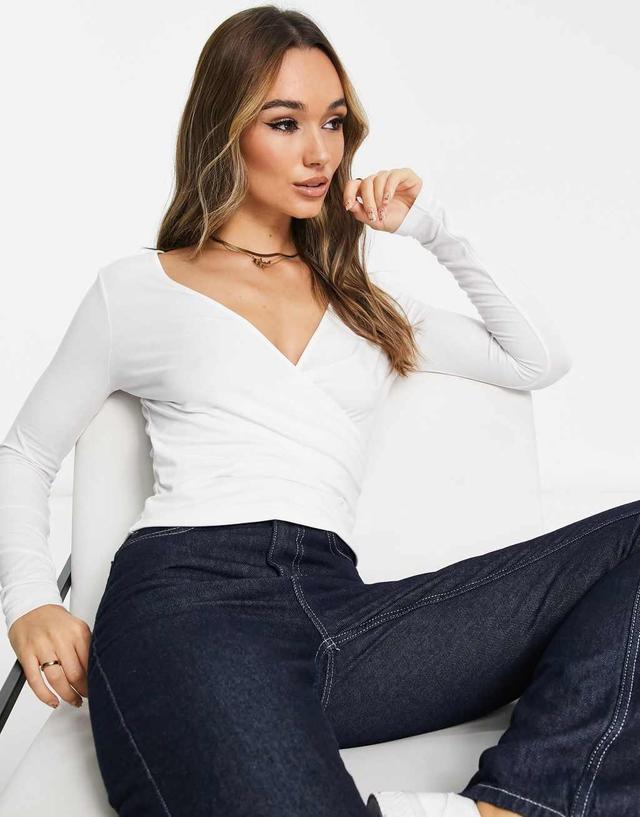 ASOS DESIGN long sleeve wrap top in white Product Image