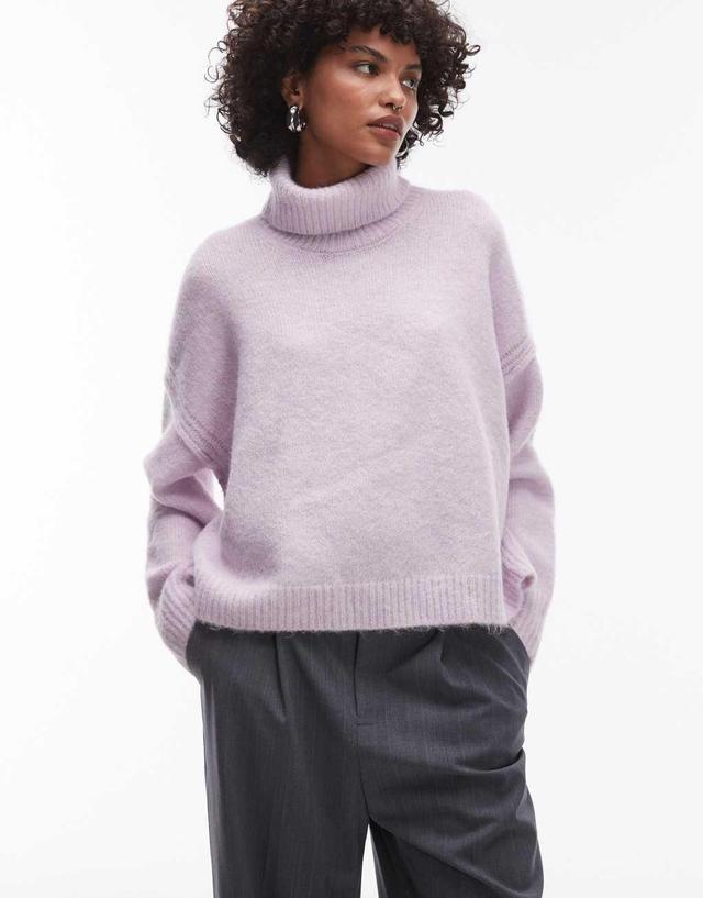 Topshop knitted exposed seam roll neck relaxed sweater in lilac Product Image