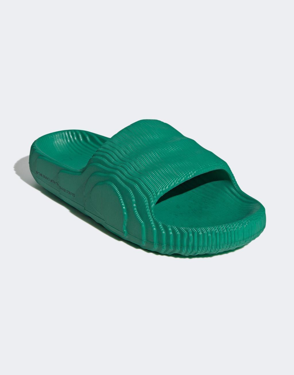 adidas Originals Adilette slides in green Product Image