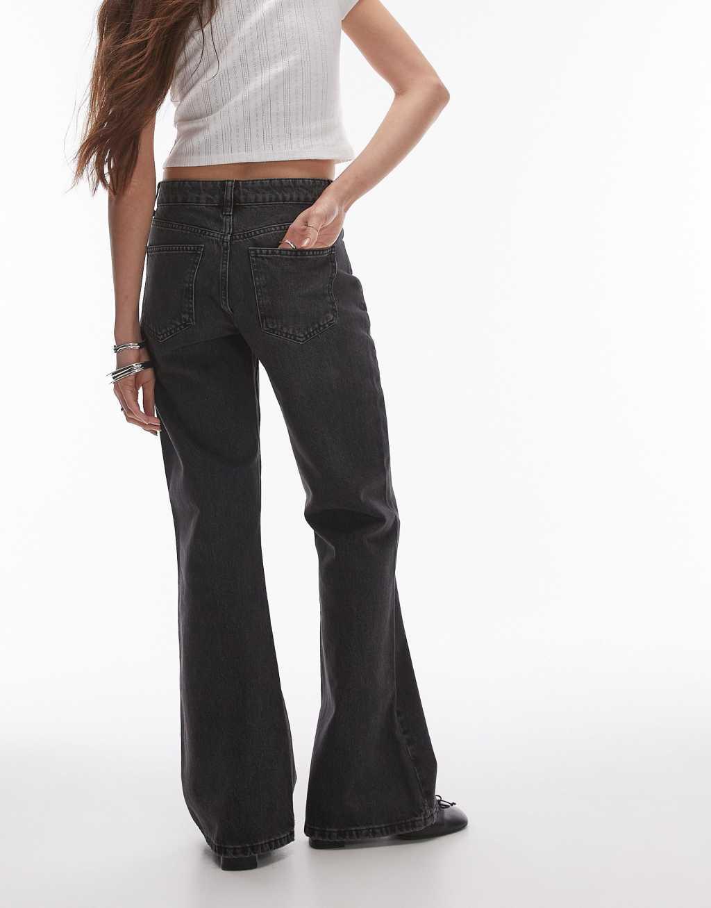 Topshop mid rise 90s flare jeans in washed black Product Image