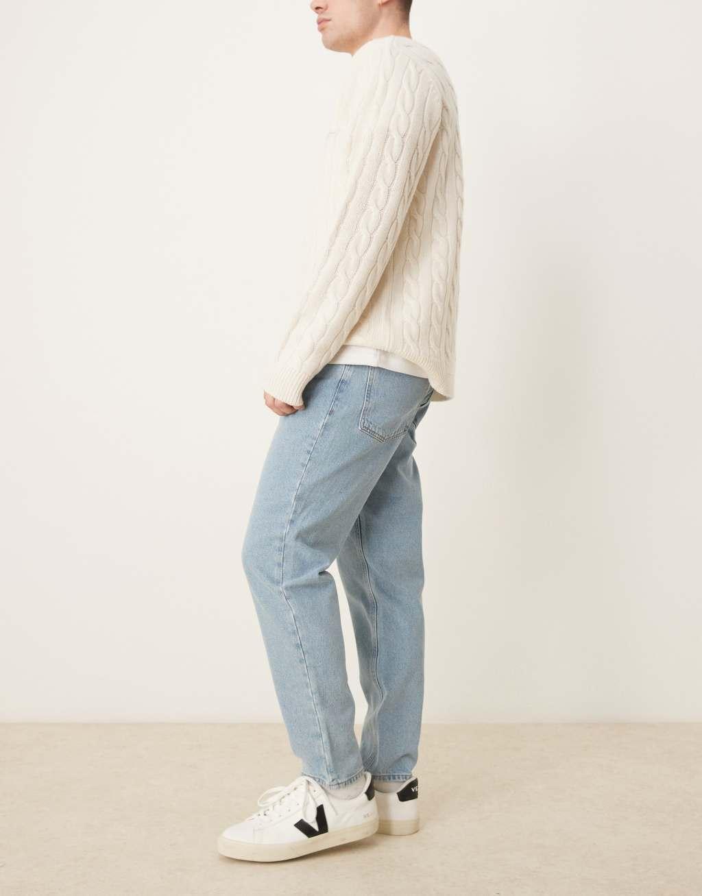 ASOS DESIGN tapered fit jeans in mid wash blue   Product Image