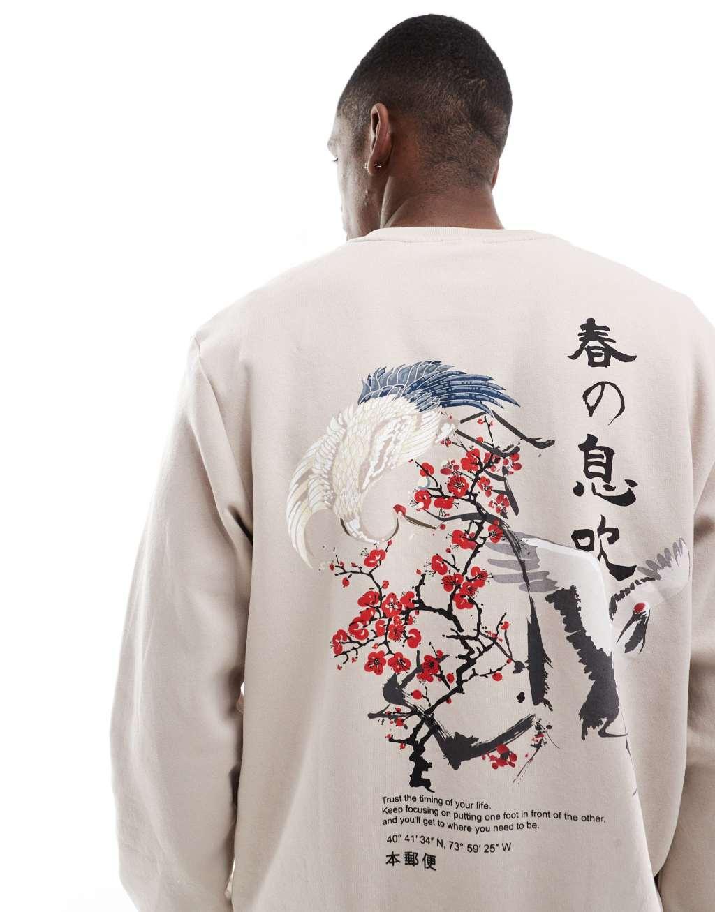 Jack & Jones oversized crew neck sweatshirt with cherry blossom back print in beige  Product Image