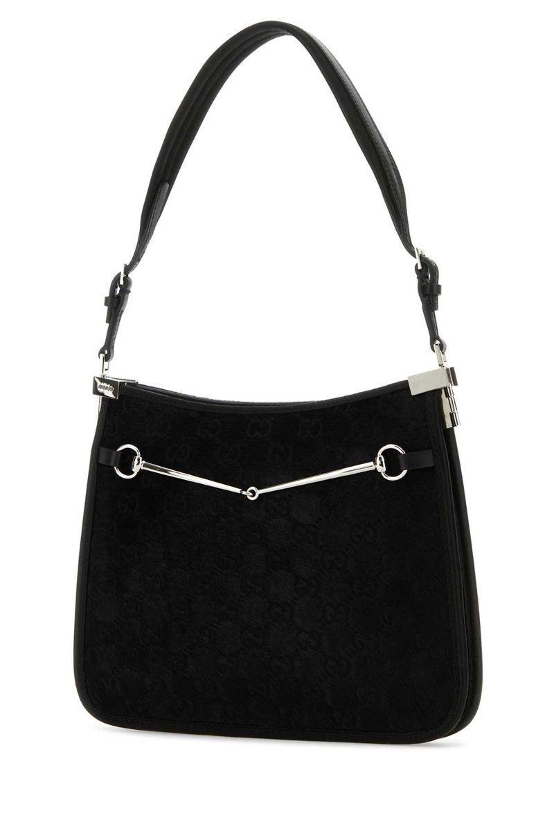 Handbags. In Black Product Image