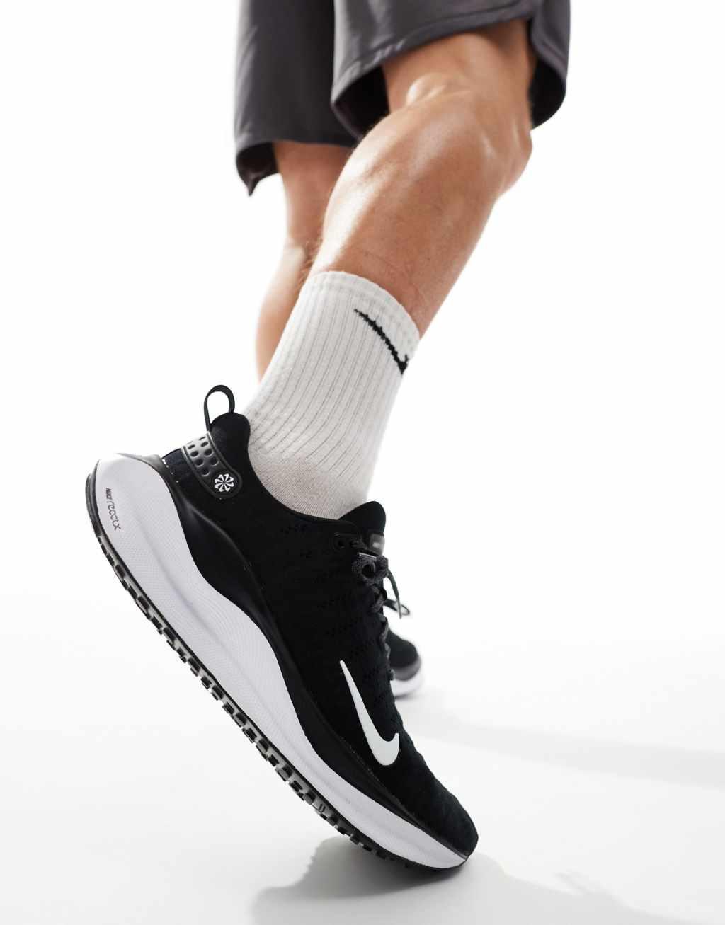 Nike Running Infinity Run 4 sneakers in black and white Product Image