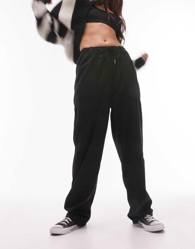 Topshop slouchy straight leg pants in black Product Image