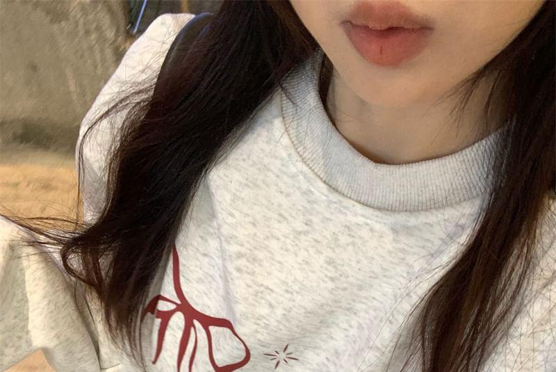 Crew Neck Lettering Bow Print Oversized Pullover Product Image