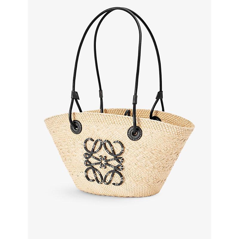 LOEWE X Paula's Ibiza Anagram Small Basket Bag In Iraca Palm With Leather Handles In Natural Black Product Image