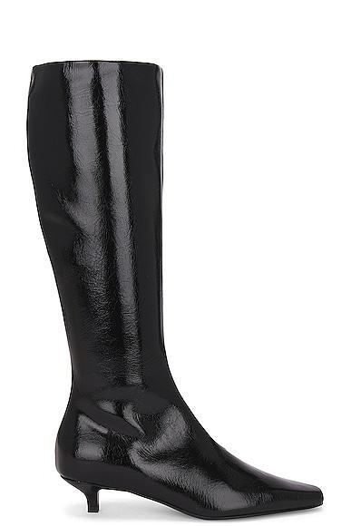 Toteme Slim Knee High Boot in Black - Black. Size 36 (also in 39). Product Image