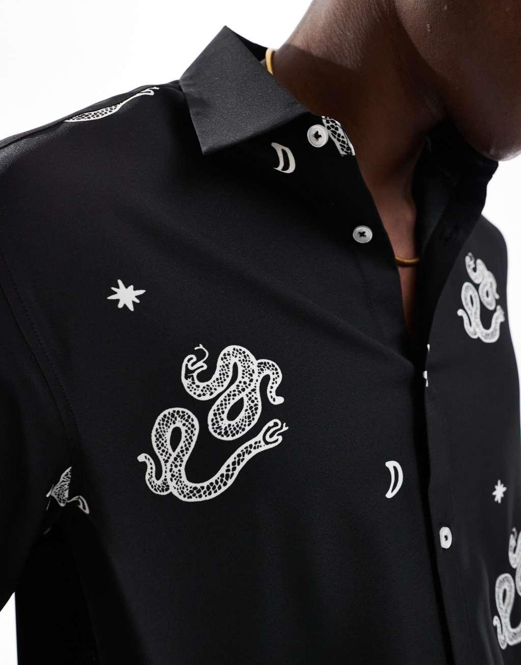 ASOS DESIGN relaxed shirt with snake print in black Product Image