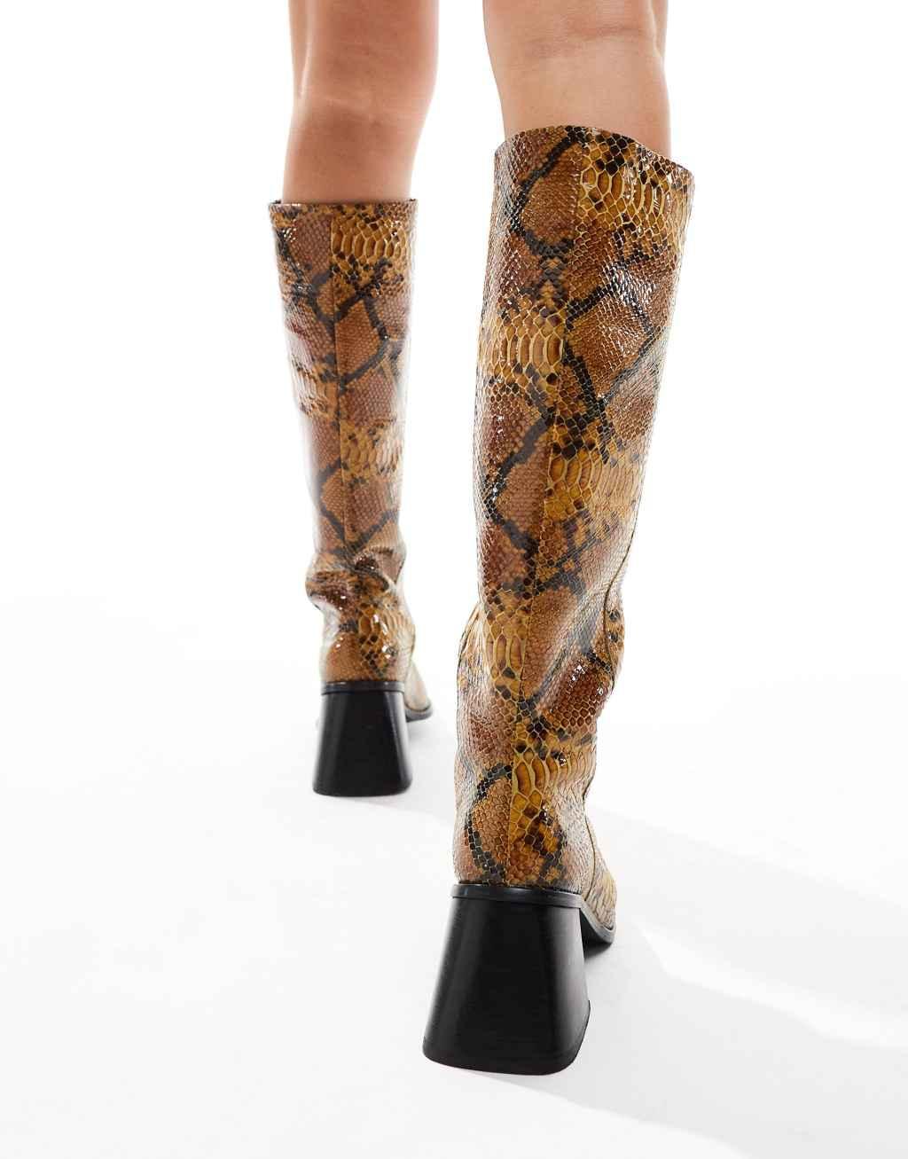 ASOS DESIGN Connect leather pull-on knee boots with flared heels in snake Product Image