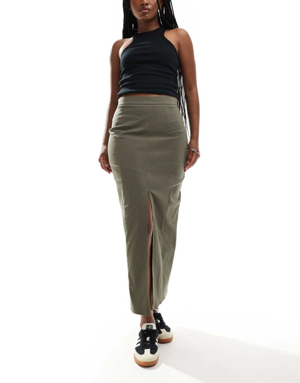 ASOS DESIGN midi skirt with front split in khaki Product Image