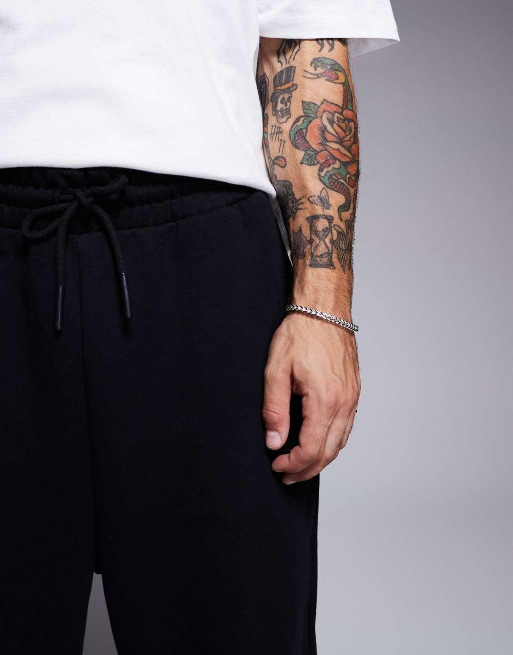 ASOS DESIGN premium heavyweight oversized sweatpants in black Product Image