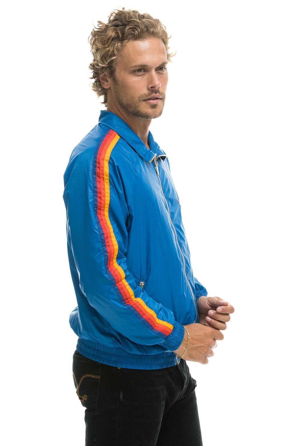 MEN'S 4 STRIPE WINDBREAKER -  SNORKEL BLUE Male Product Image