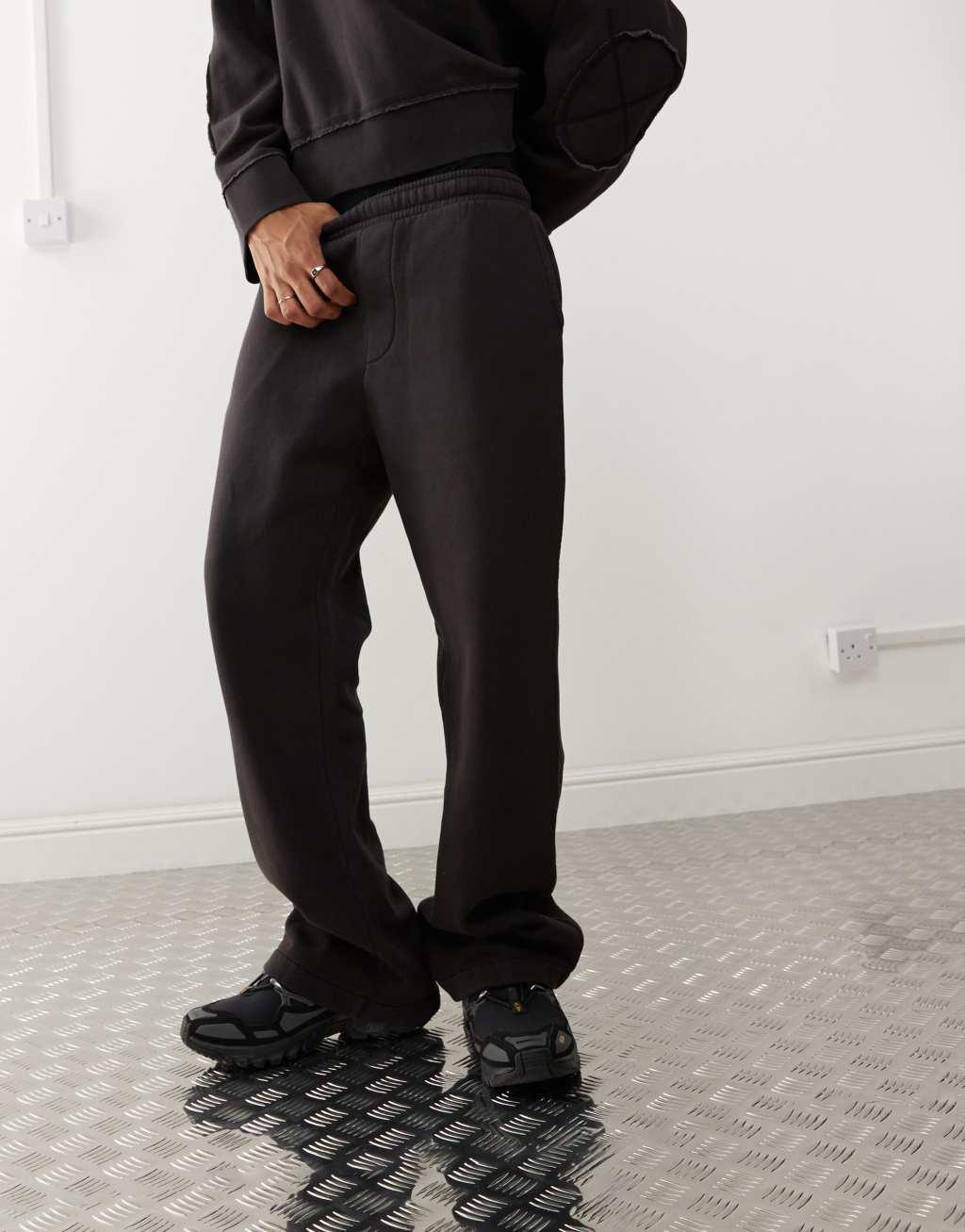 Weekday relaxed sweatpants in black acid wash - part of a set Product Image