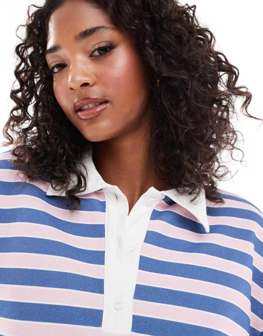 ASOS DESIGN striped rugby sweatshirt polo in pink Product Image