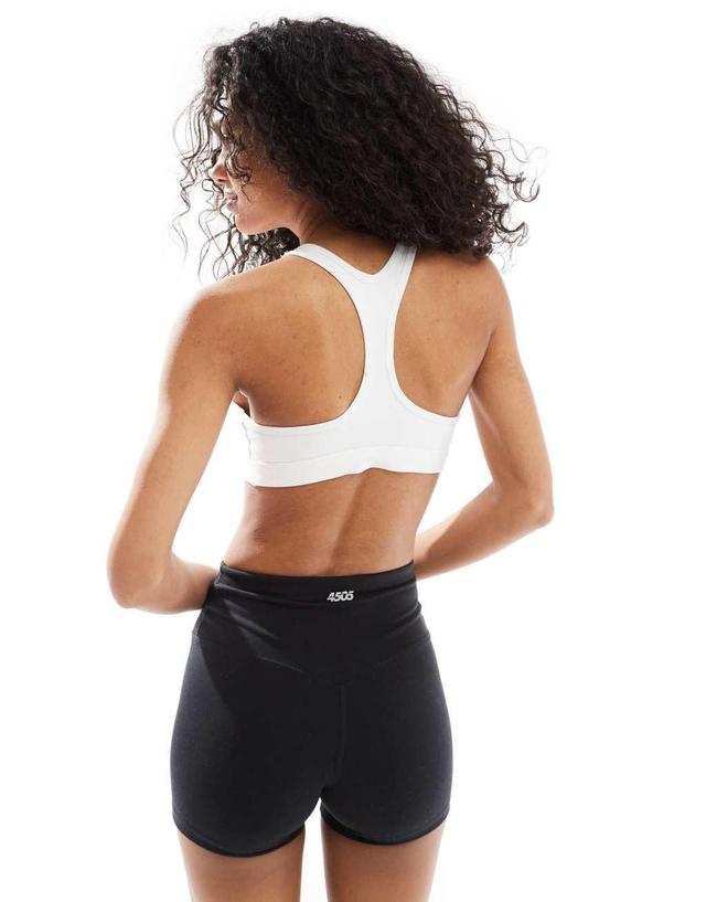 Nike Training Swoosh light support sports bra in white Product Image