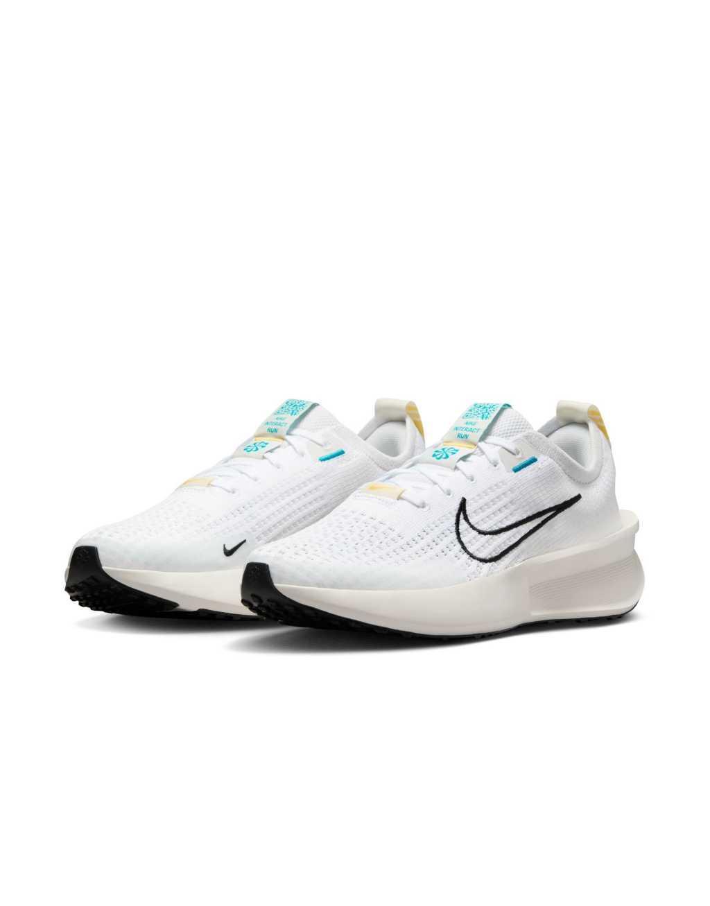 Nike Running Interact sneakers in white Product Image