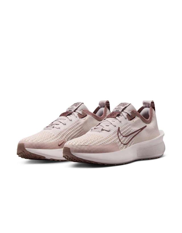 Nike Running React Infinity Run Flyknit sneaker in light pink Product Image