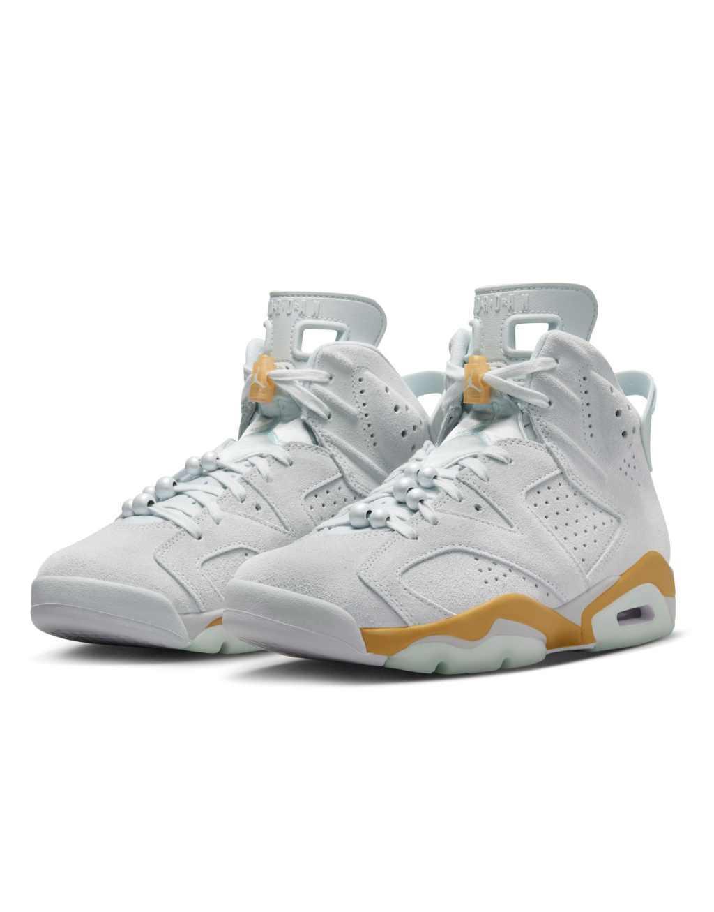 Nike Air Jordan 6 sneakers in light gray and gold Product Image