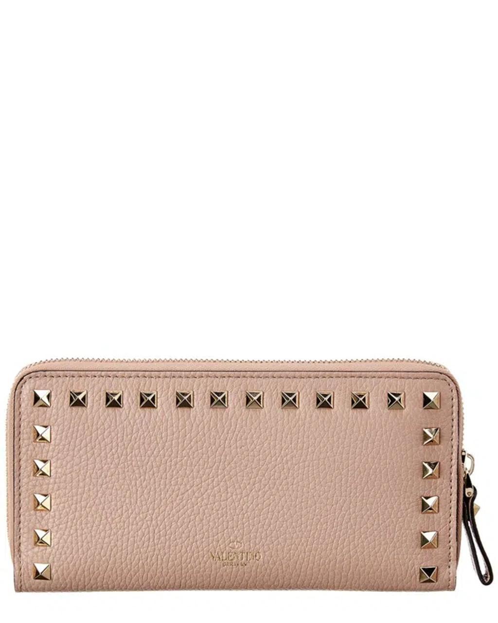 VALENTINO GARAVANI Valentino Rockstud Grainy Leather Zip Around Wallet In Beige Product Image