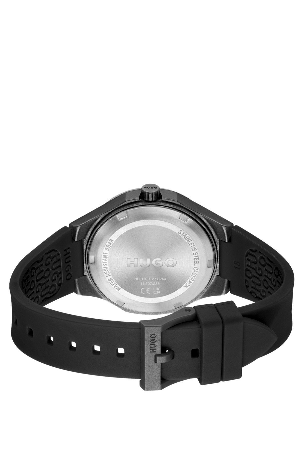 Matte-black watch with branded silicone strap Product Image