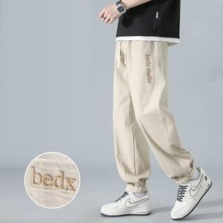 Drawstring Waist Lettering Embroidered Loose Fit Pants Product Image