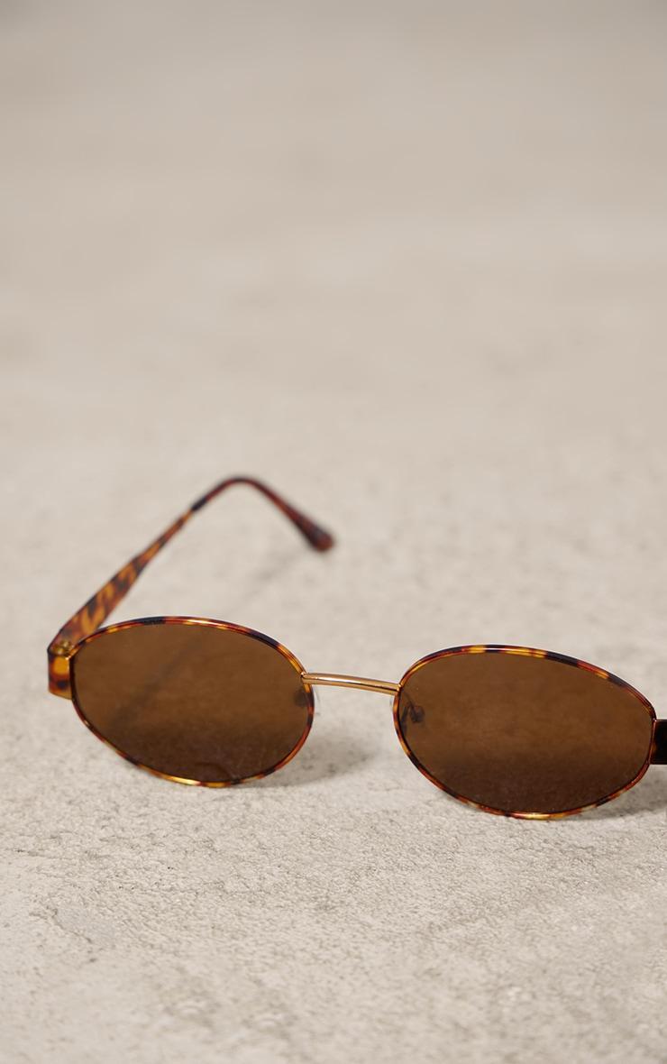 Tortoiseshell Frame Round Sunglasses Product Image