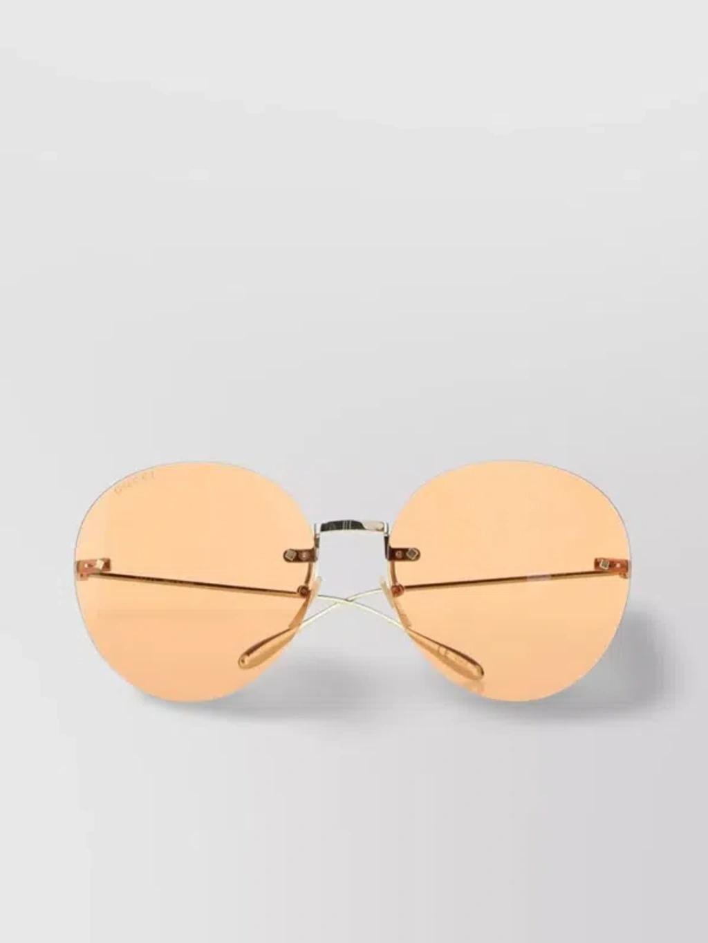 Metal Frame Round Sunglasses With Curved Temple Tips In Cream Product Image