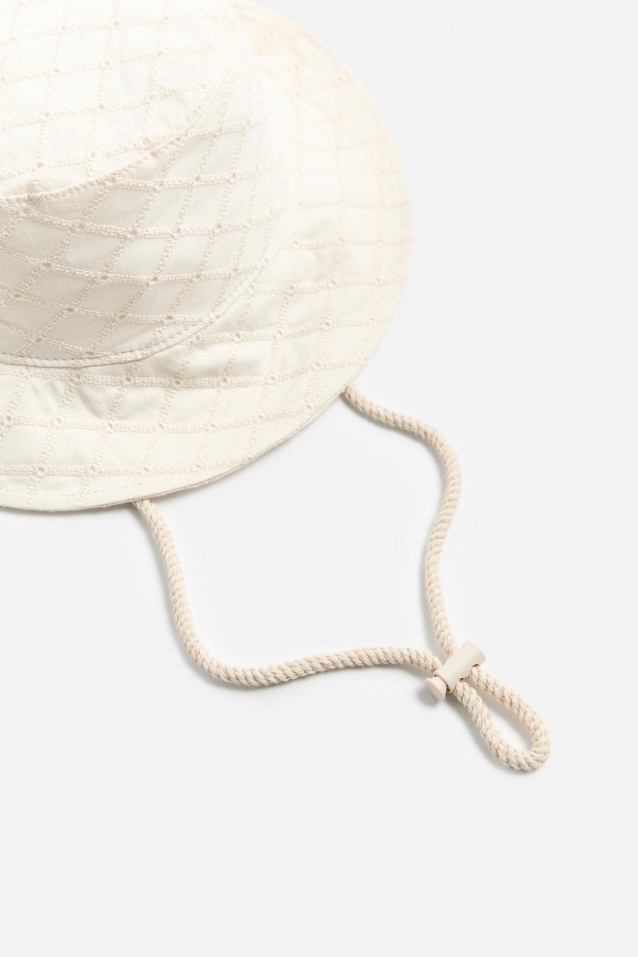 EMBROIDERED EYELET HAT Product Image