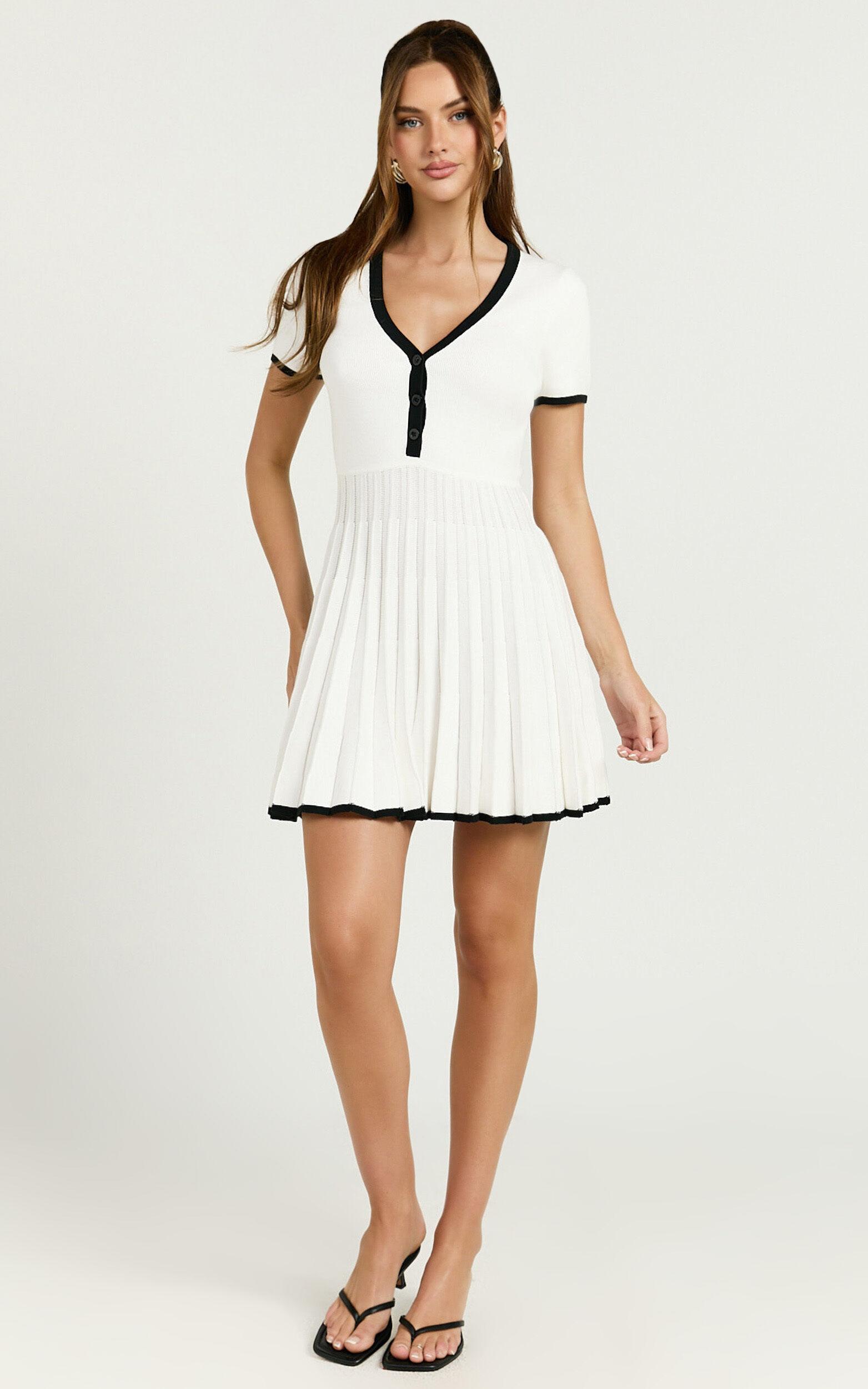 Vivienne Mini Dress - Short Sleeve Pleated Skirt Knitted Dress in Cream Product Image