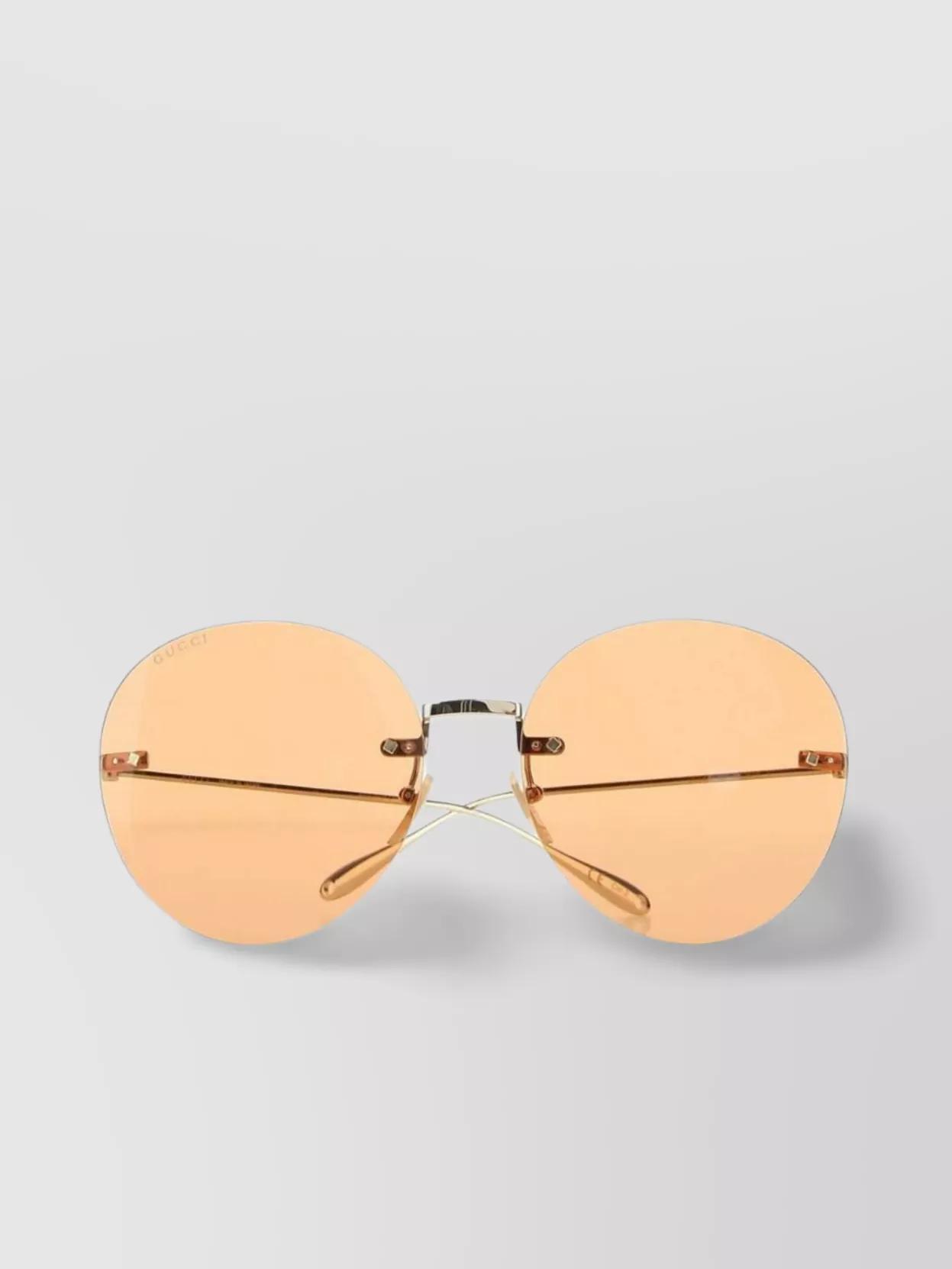 Metal Frame Round Sunglasses With Curved Temple Tips In Cream Product Image