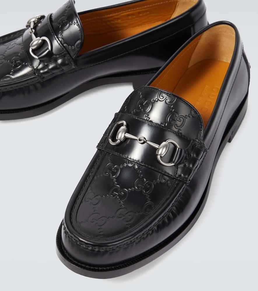 GUCCI Horsebit Debossed Gg Leather Loafers In Black Product Image