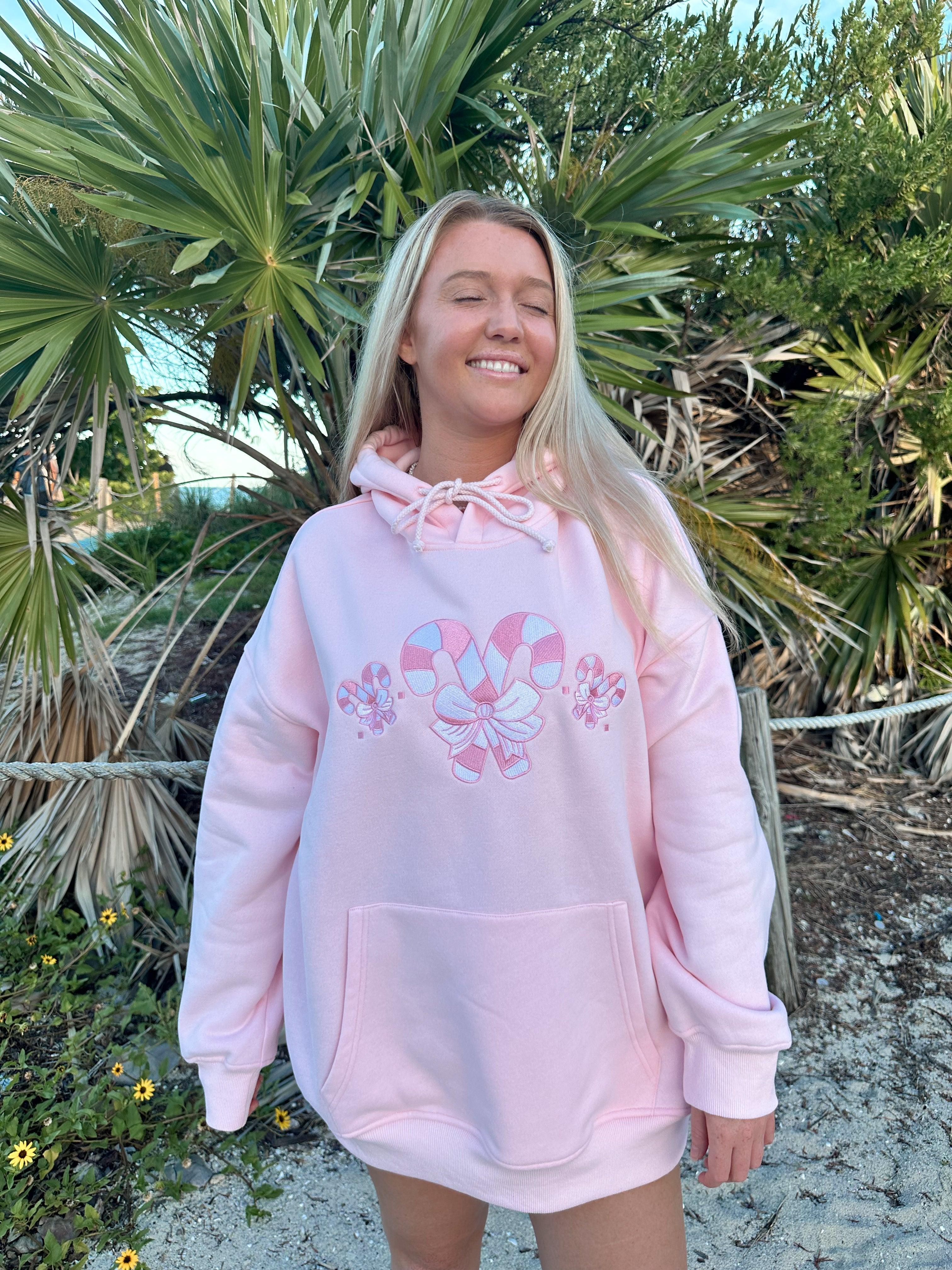 Light Pink Candy Cane Wonderland Hoodie Product Image