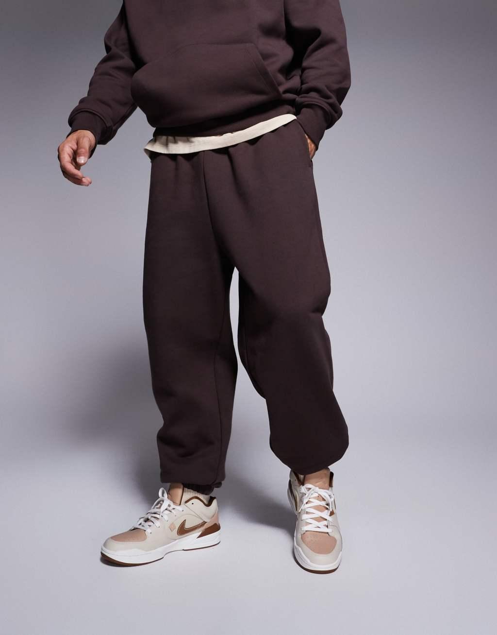 ASOS DESIGN premium heavyweight oversized sweatpants 400gsm in brown Product Image