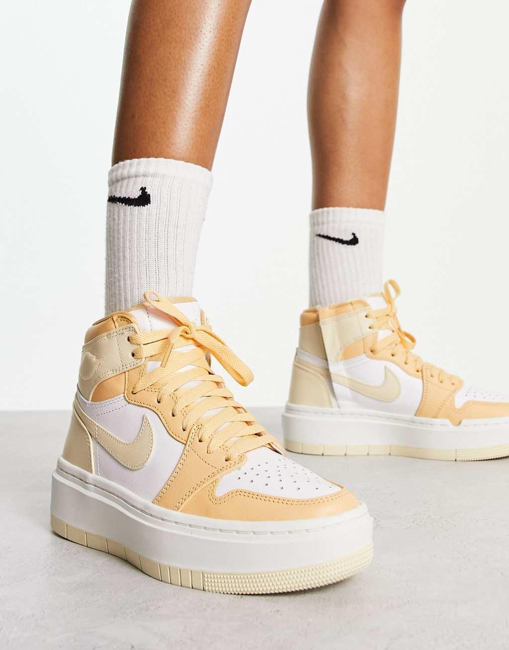 Nike Jordan 1 Elevate High sneakers in gold and white Product Image