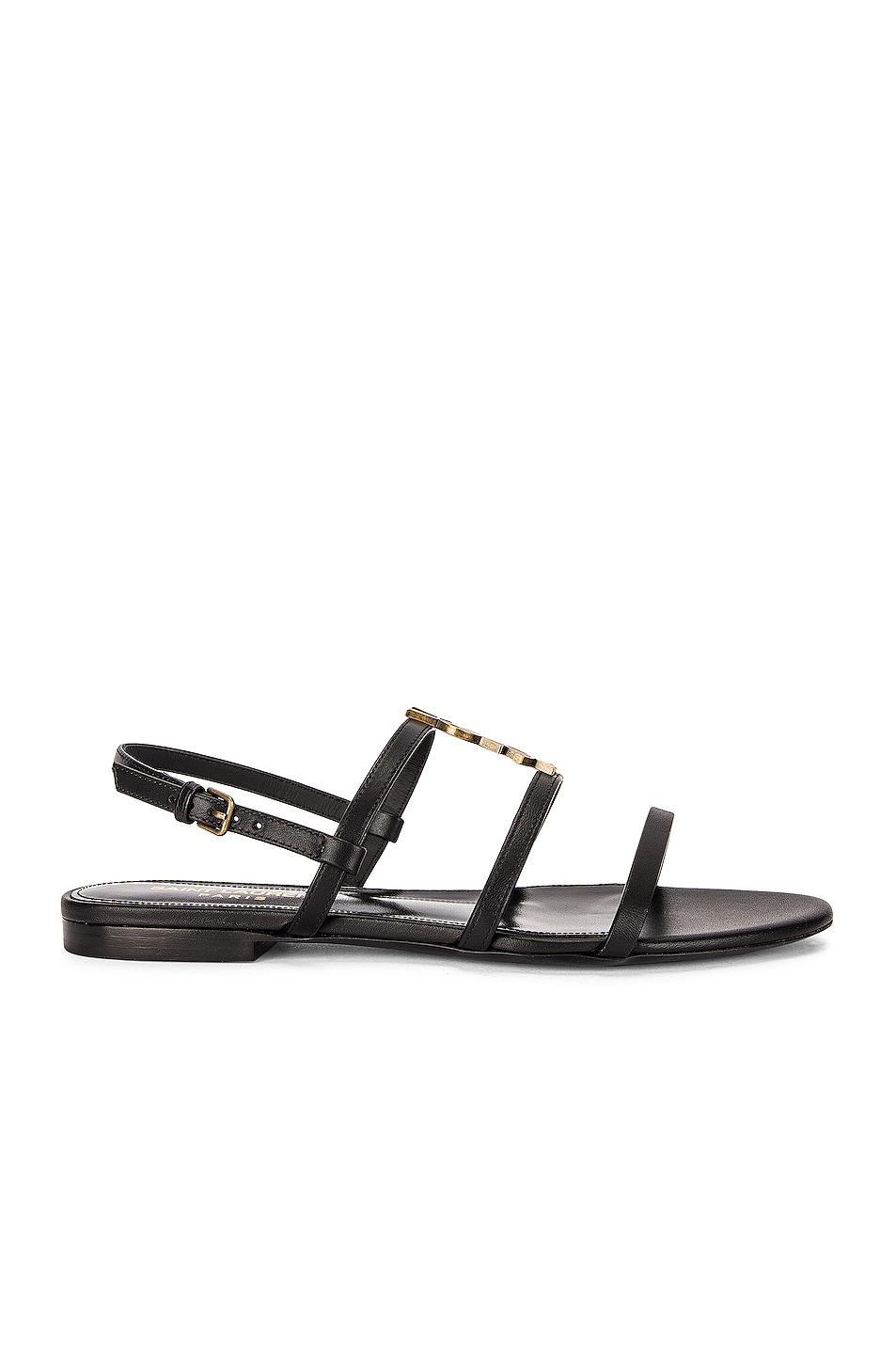 Saint Laurent Cassandra Leather Flat Sandals in Black Product Image