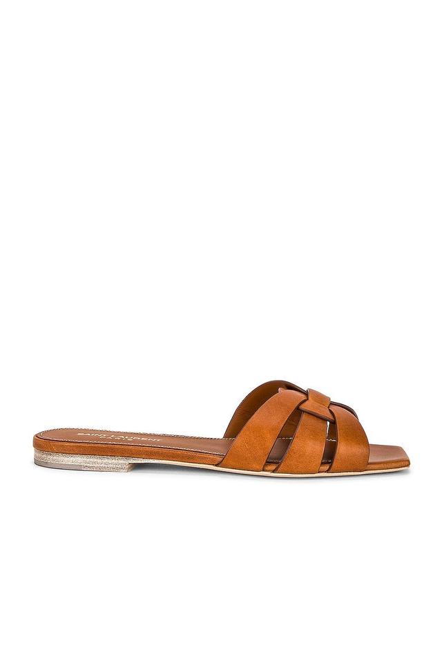 Saint Laurent Tribute Flat Sandal in Amber - Brown. Size 36.5 (also in 37, 38, 39, 40, 40.5, 41). Product Image