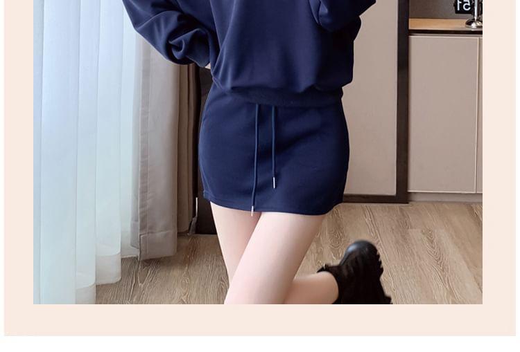 Set: Off Shoulder Plain Oversized Sweatshirt + Mid Waist Plain Mini Pencil Skirt Product Image