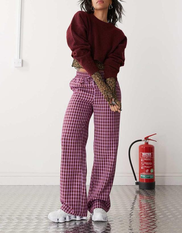 Reclaimed Vintage pull on relaxed pants in pink gingham Product Image