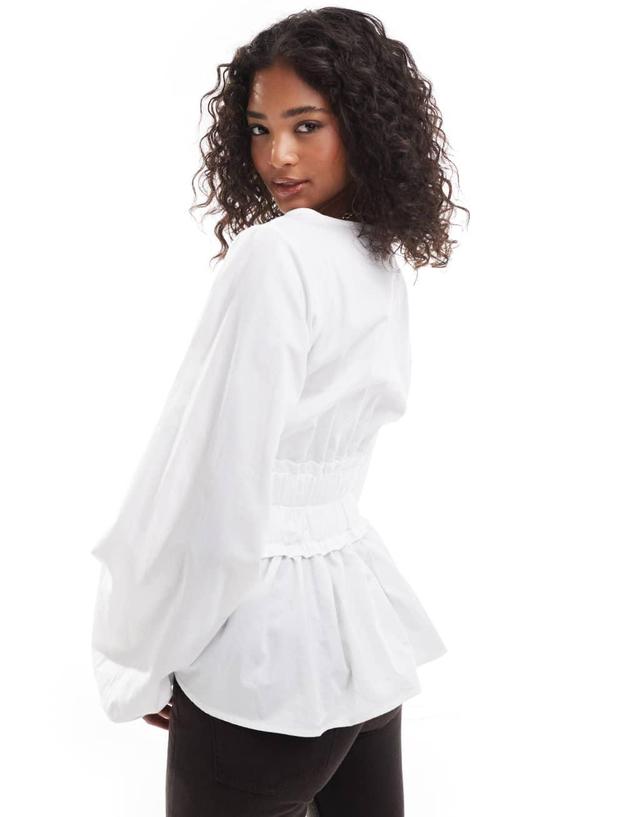 ASOS DESIGN elasticated waist blouson sleeve blouse in white Product Image